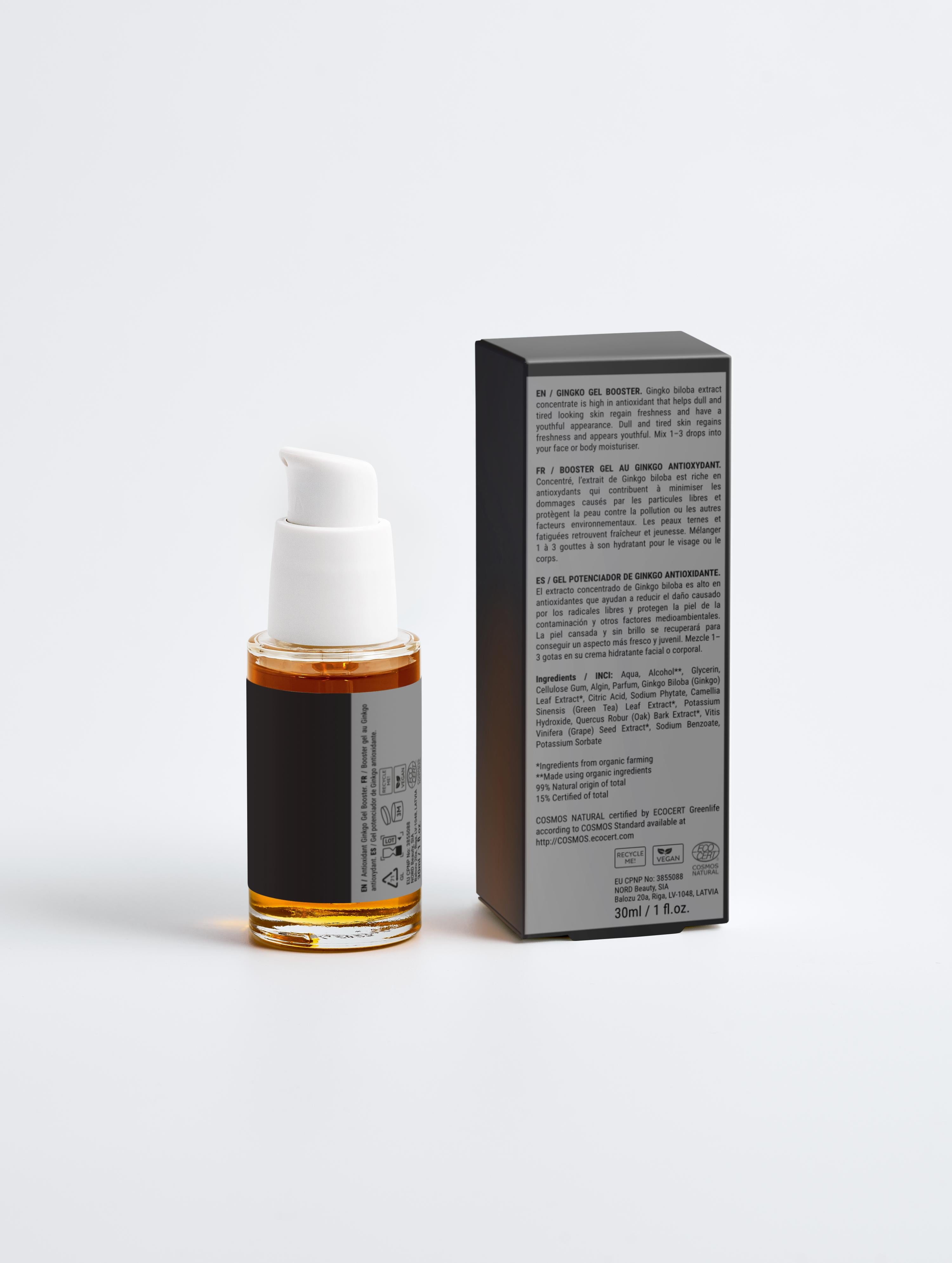 Skincare bottle with pump and packaging on a white background