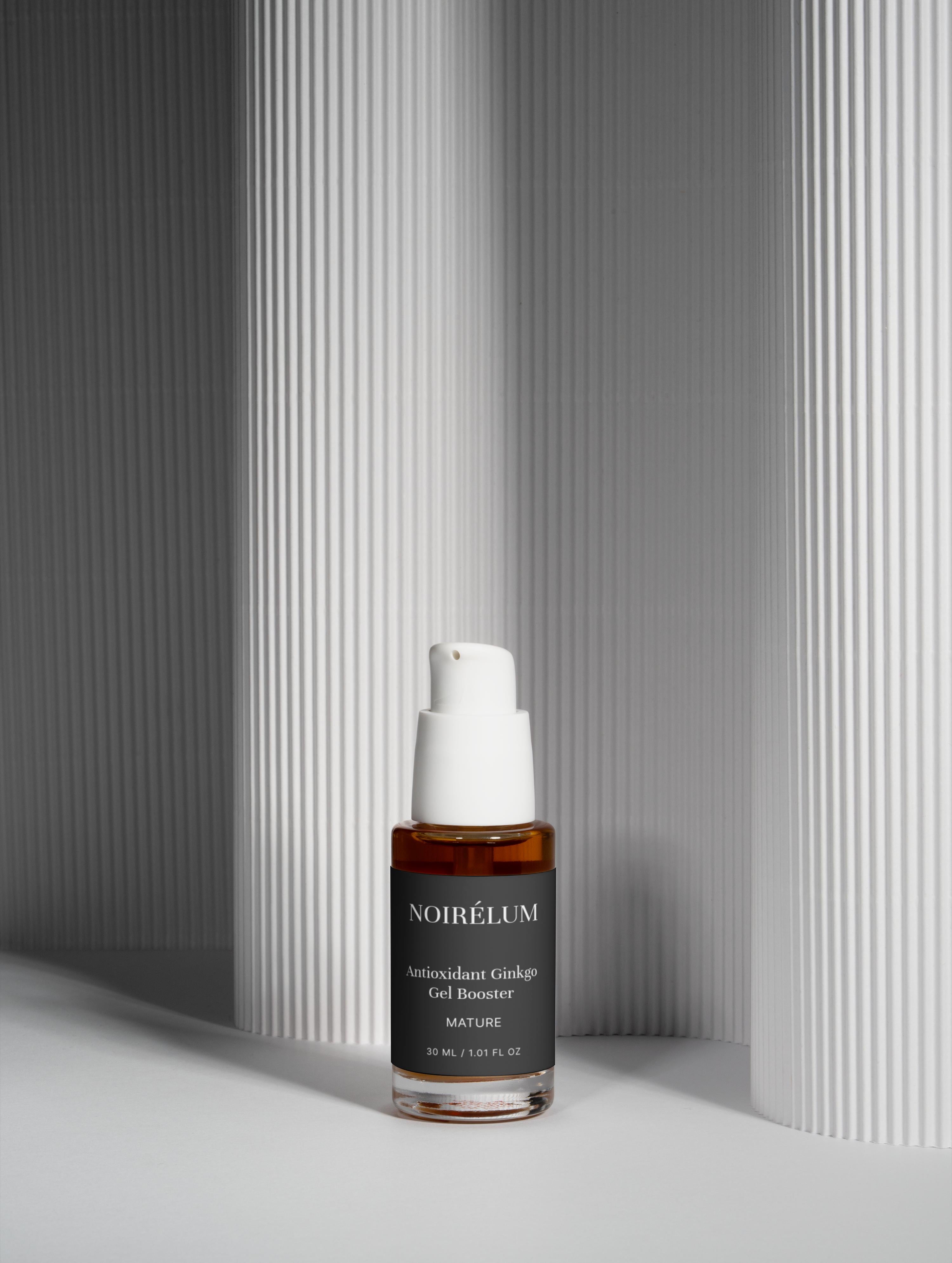 Oerra skincare serum bottle on a neutral background