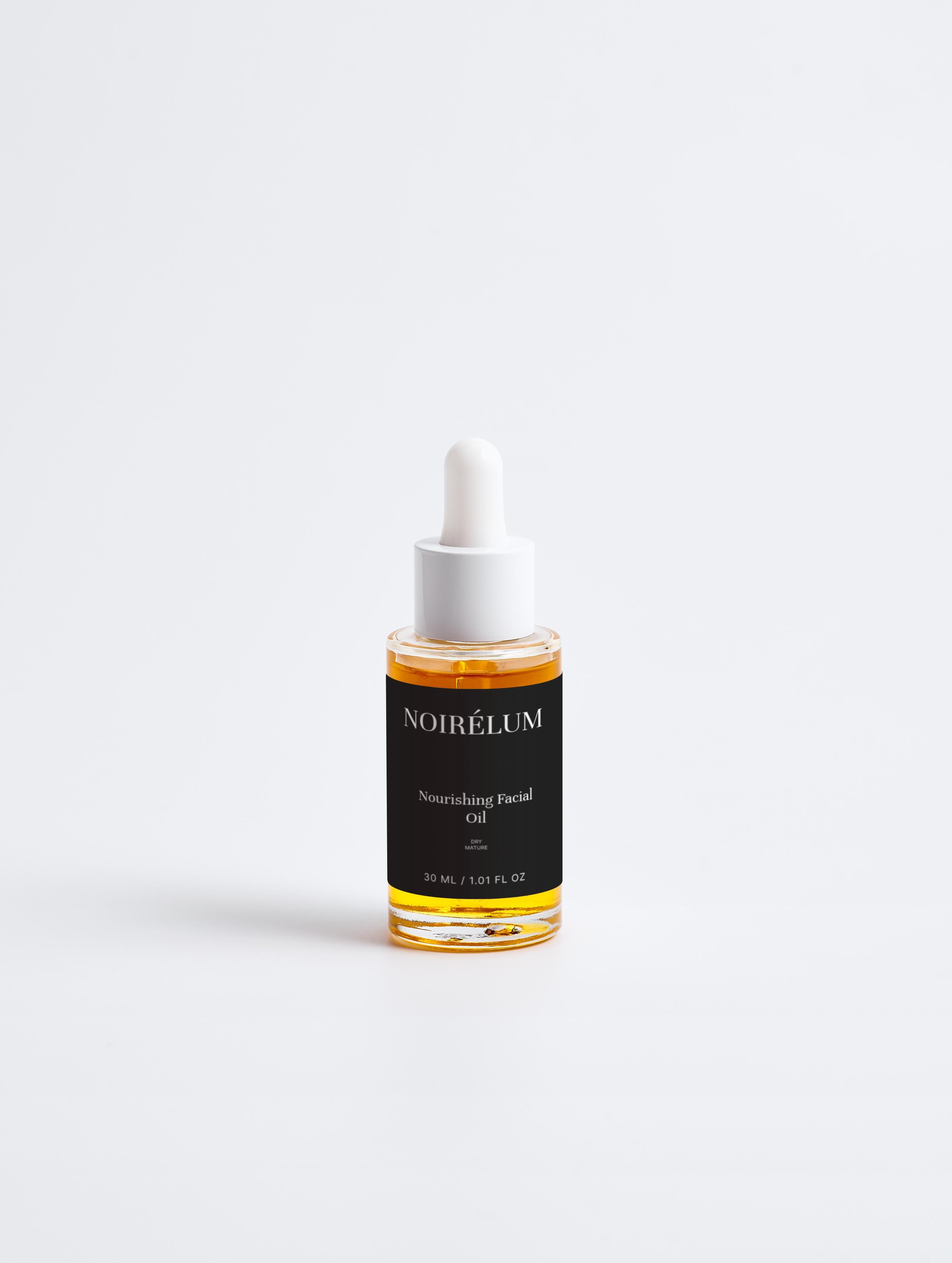 Bottle of Noirelum Nourishing Facial Oil with dropper on a white background