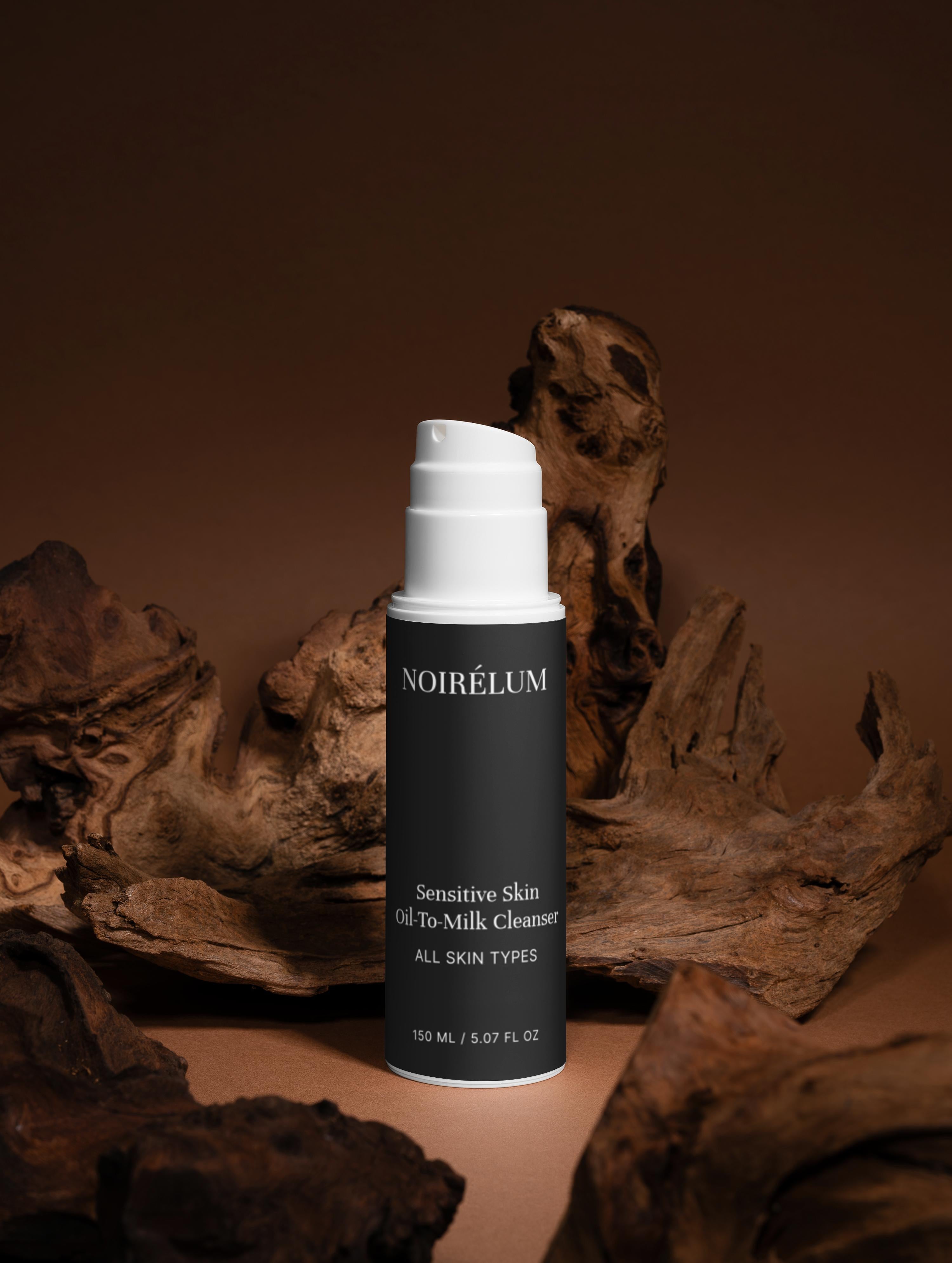 Skincare bottle with natural elements on a brown background