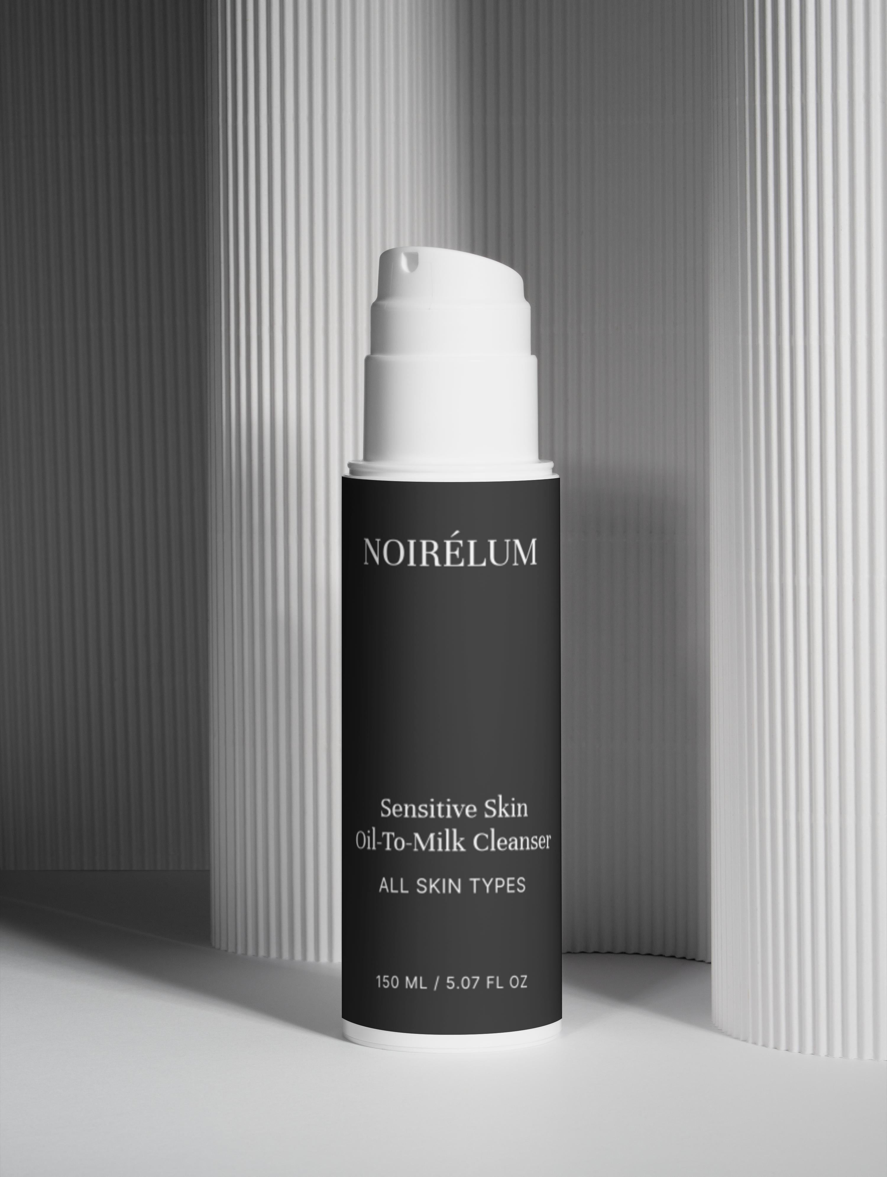 Paryon sunscreen bottle on a gray background