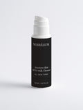 Skincare bottle labeled 'Noirelum' on a light gray background